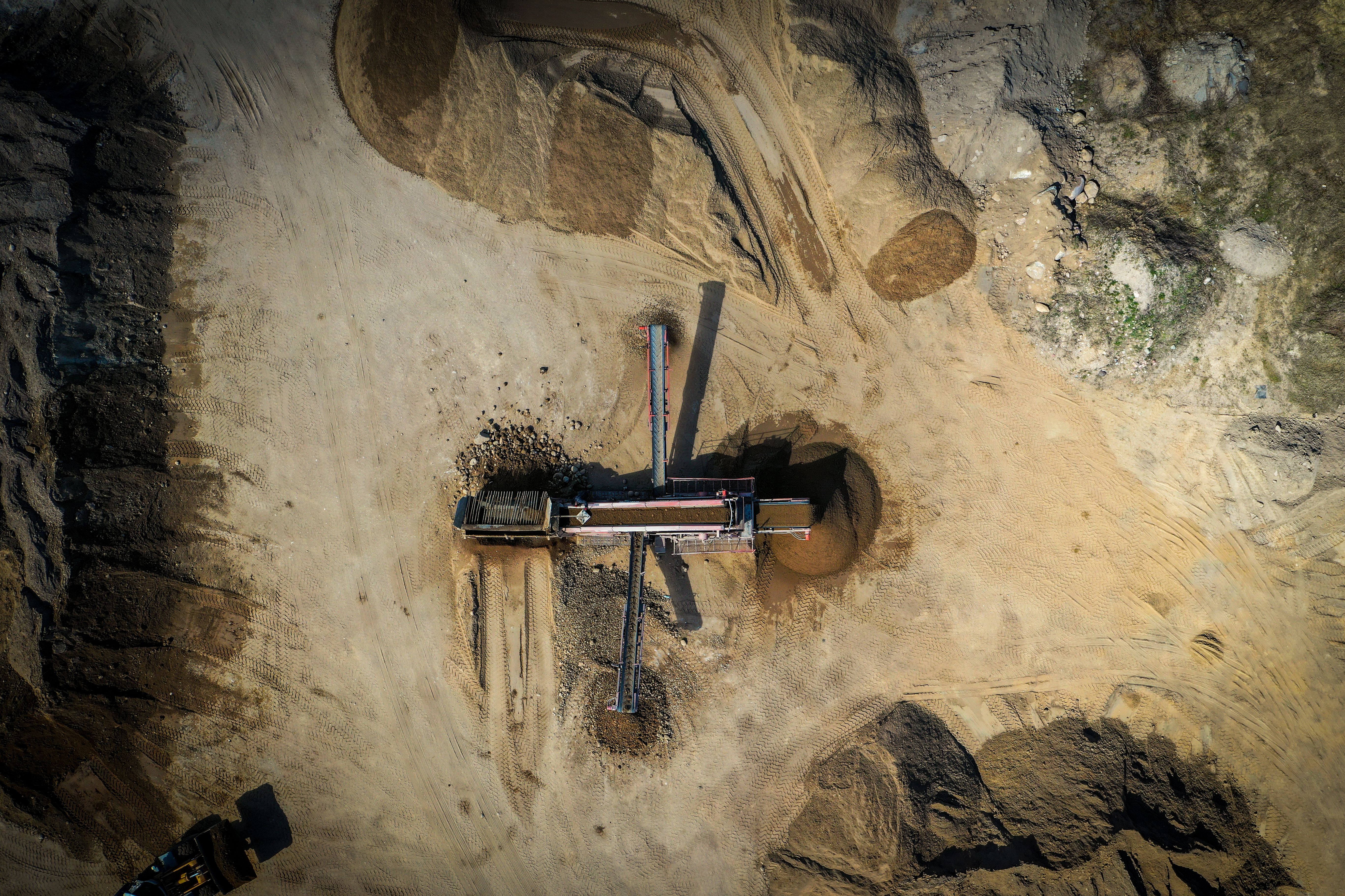 Aerial view of industrial mineral crushing and processing equipment